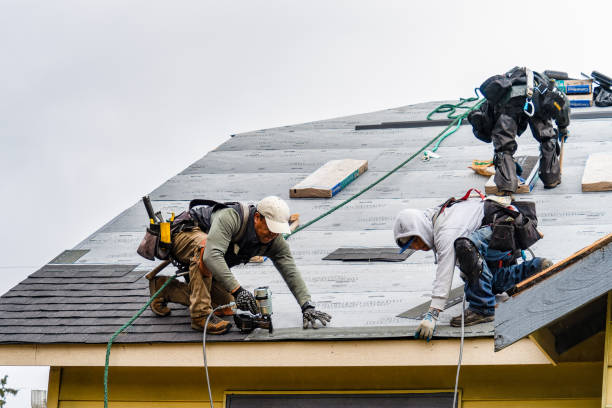 Professional Gutter Installation technician working in Drewsville, NH